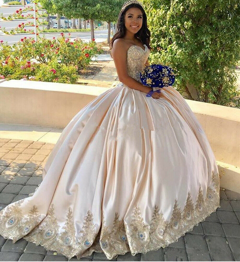 champagne and gold quinceanera dress,gold quinceanera dress,plus size dress for quinceanera,satin quinceanera dress,strapless sweetheart quinceanera dress,inexpensive quinceanera dress,cheap quinceanera gown under 200 dollars,