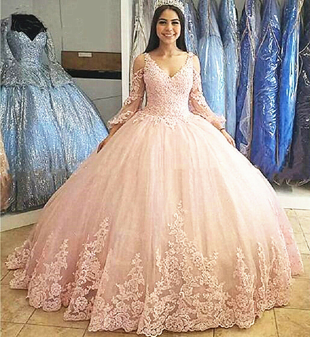 light pink quinceanera dress with sleeves,light pink sweet 15 dress,vintage lace dress for quinceanera,sexy princess lace quinceanera dress,long sleeve lace quinceanera dress,long sleeves illusion quinceanera dress,quinceanera dress with short train,cheap quinceanera gown under 200 dollars,