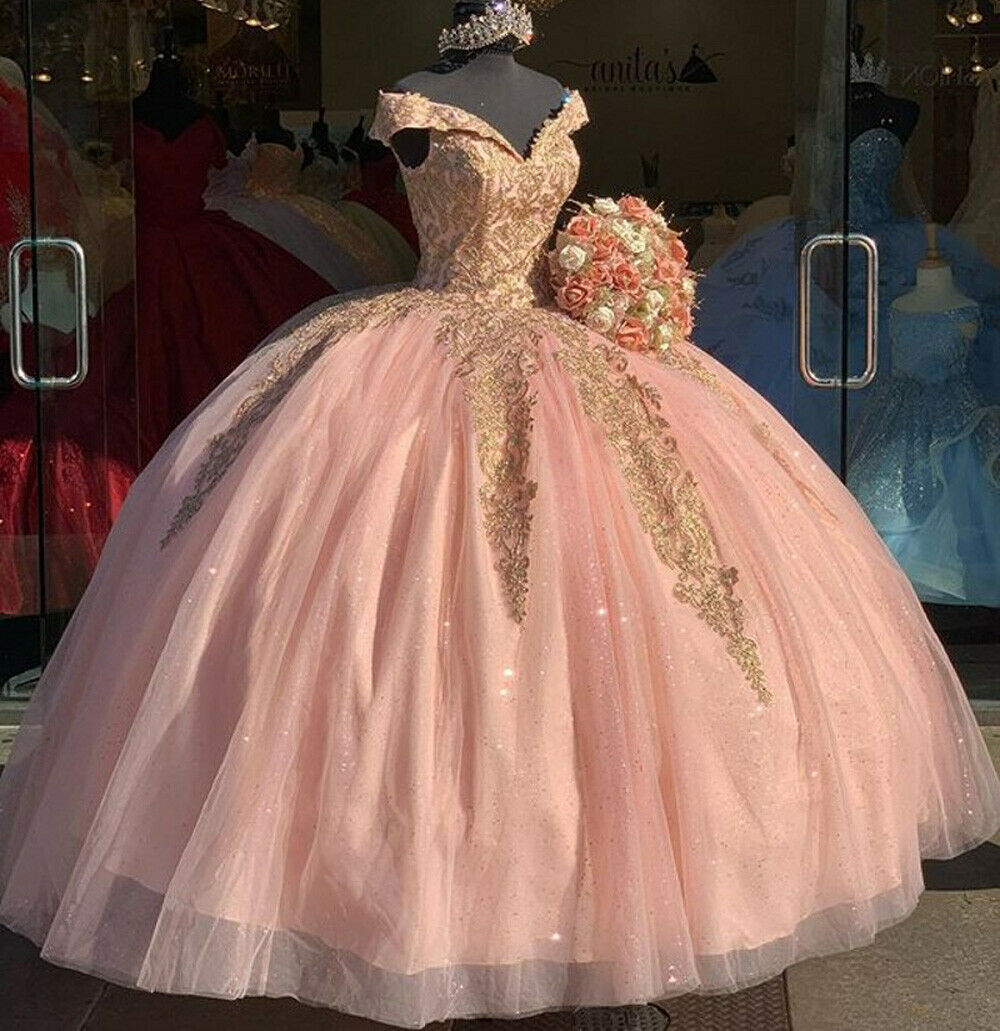 gold and pink quinceanera dress,baby pink quinceanera dress,pink ball gown quinceanera dress,off the shoulder sweet 16 dress,deep v neckline quinceanera dress,where can i find sparkly quinceanera dress,
