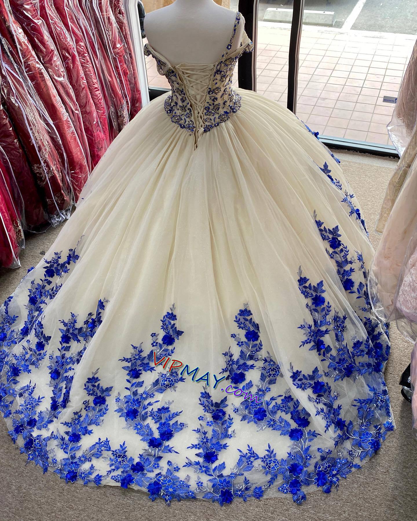 champagne colored quinceanera dress,in royal blue quinceanera dress,tulle skirt quinceanera dress,3d floral applique quinceanera dress,beaded bodice quinceanera dress,off shoulder quinceanera dress,2021 quinceanera dress,stores that sell quinceanera dress,cheap quinceanera dress stores,