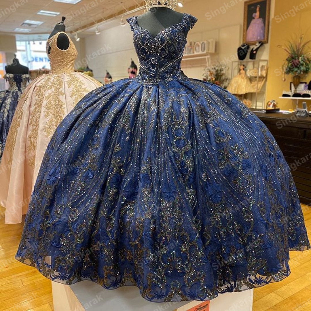 ready to ship quinceanera dresses,sparkly quinceanera dress,full sequin pageant dress for teenage girl,sequin ball gown charro quinceanera dress,cap sleeves quinceanera dress,2021 quinceanera dress,pink ball gown quinceanera dress,strapless sweetheart quinceanera dress,