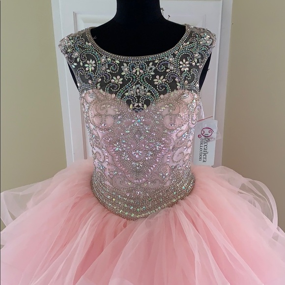 beautiful quinceanera dress pinterest,most beautiful quinceanera dress,pink sweet 16 dress,illusion neckline quinceanera dress,quinceanera dress with keyhole back,beaded bodice quinceanera dress,tulle skirt quinceanera dress,