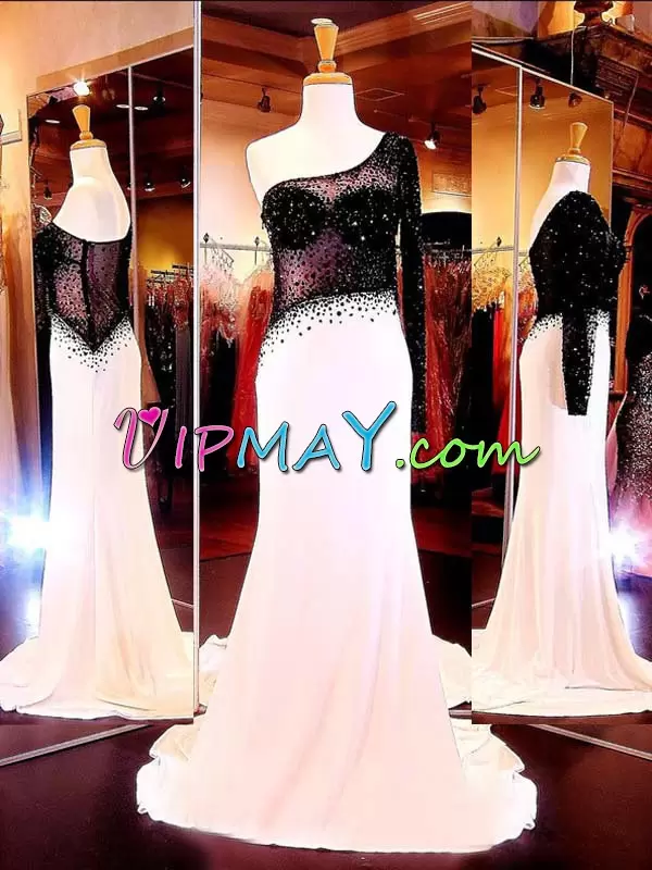 prom dress with sheer neckline,sheer corset prom dress,one sleeve mermaid prom dress,one sleeve prom dress,one shoulder long sleeve formal dress,affordable mermaid prom dress,mermaid fitted prom dress,illusion mermaid prom dress,black and white hoco dress,white and black prom dress,long sleeve mermaid prom dress,long sleeve illusion dress,cheap long sleeve mermaid prom dress,long sleeve see through prom dress,