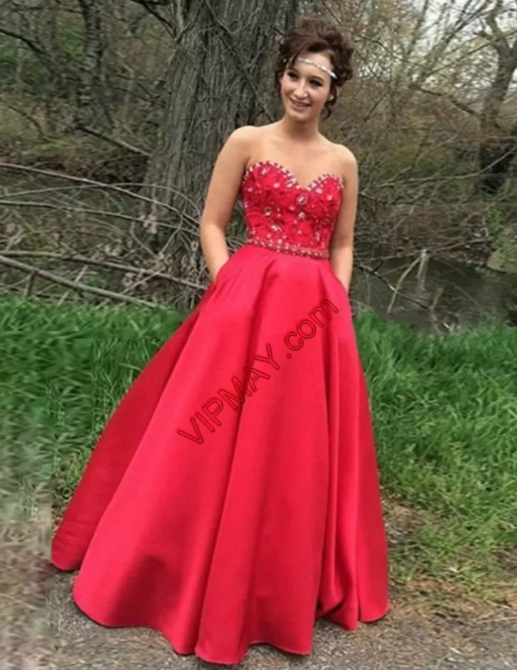 long red strapless prom dress,red satin floor length dress,satin sweetheart prom dress,satin prom dress styles,red sweetheart neckline prom dress,a line sweetheart prom dress,sweetheart sleeveless prom dress,strapless prom dress with pockets,prom dress with pockets,