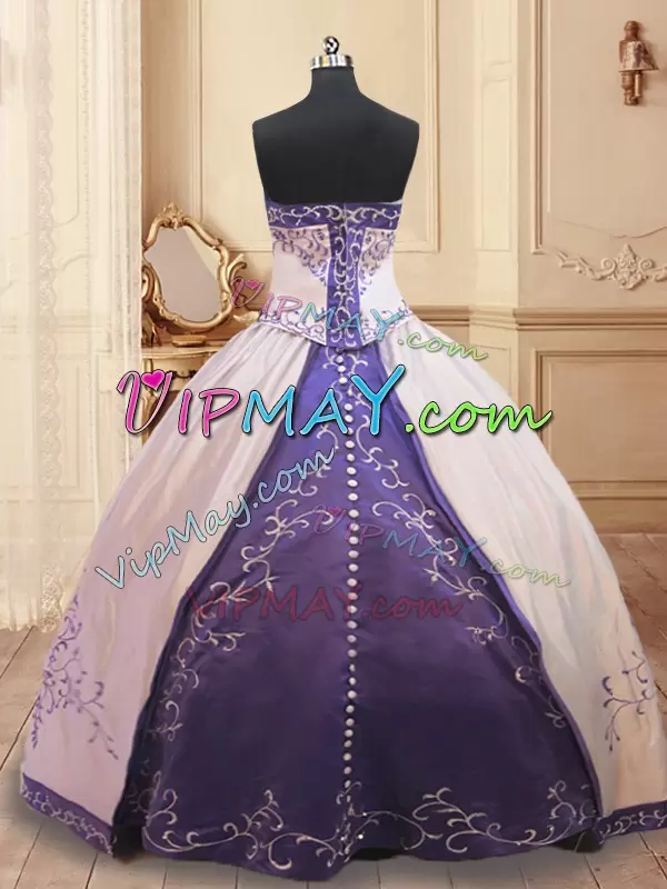 customize quinceanera dress online,embroidery quinceanera dress,white and purple quinceanera dress,purple and white quinceanera dress,satin quinceanera dress,white quinceanera dress,white quinceanera dress with purple embroidery,zipper back quinceanera dress,quinceanera dress with button,quinceanera dress western theme,