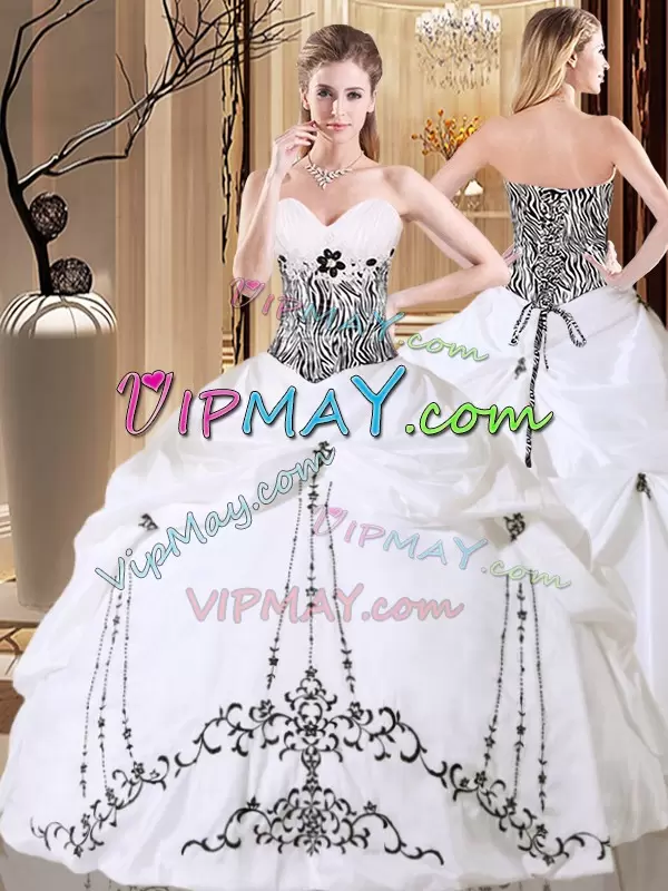 taffeta quinceanera dress,white quinceanera dress with black embroidery,white and black quinceanera dress,quinceanera dress with zebra print,zebra print formal dress,zebra quinceanera dress,animal print quinceanera dress,embroidered bridal gown,floral embroidered quinceanera dress,embroidery quinceanera dress,pick ups skirt quinceanera dress,