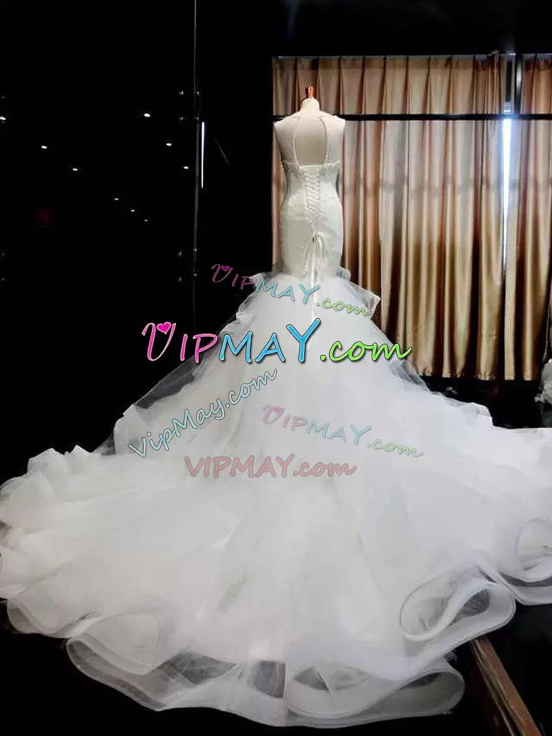 White Sleeveless Chapel Train Beading and Appliques and Ruffled Layers Wedding Gowns