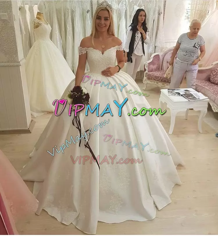 ball gown wedding dress with train,lace wedding dress with low back,wedding dress with low cut back,off the shoulder wedding dress,off the shoulder ivory wedding dress,beautiful satin wedding dress,