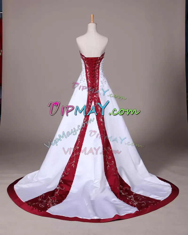 white and burgundy wedding dress,wedding dress with embroidery,vintage satin wedding gowns,beautiful satin wedding dress,wedding dress with red train,beautiful wedding dress with trains,white and red wedding dress,