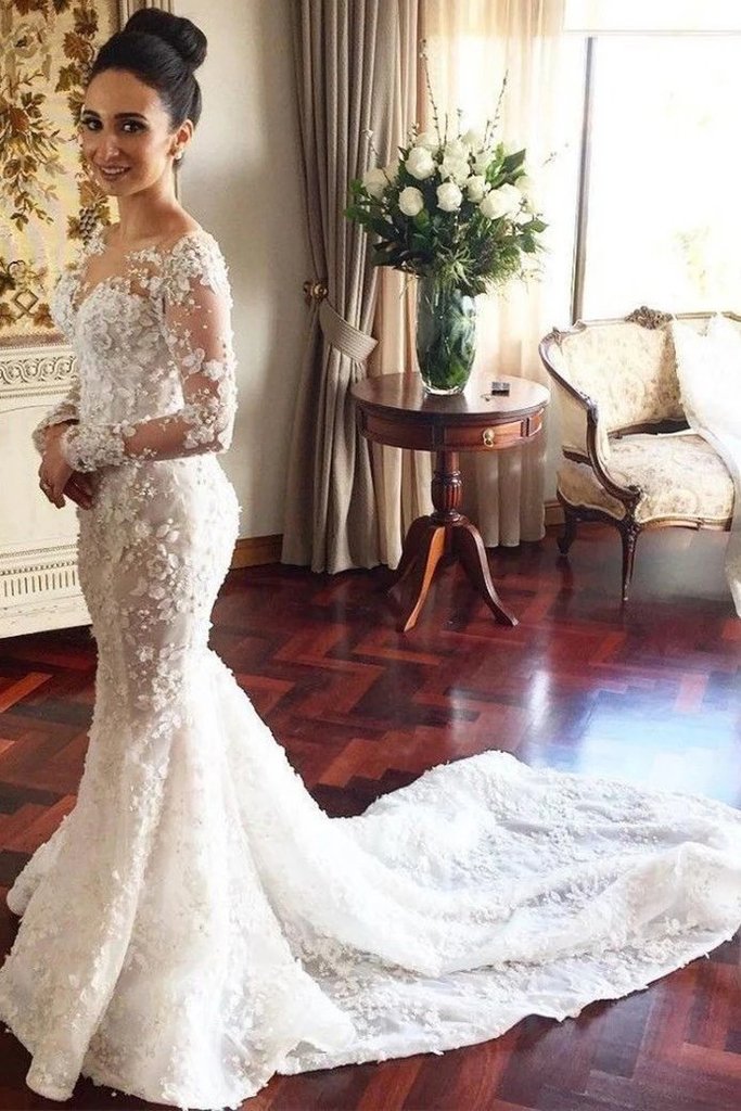 sheer neckline wedding dress,mermaid cathedral train wedding dress,arabic mermaid wedding dress,lace mermaid wedding dress long sleeves,long sleeve fishtail wedding dress,long sleeve lace overlay wedding dress,full lace long sleeve wedding dress,ivory lace wedding dress with sleeves,long sleeve lace fitted wedding dress,fit and flare wedding dress with long train,wedding dress with very long trains,custom made wedding dress online,